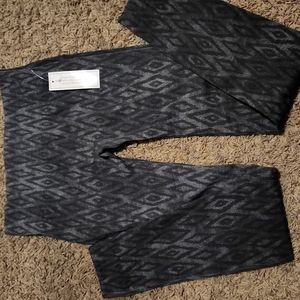 I am unsure of the brand or even the size of these yoga pants.